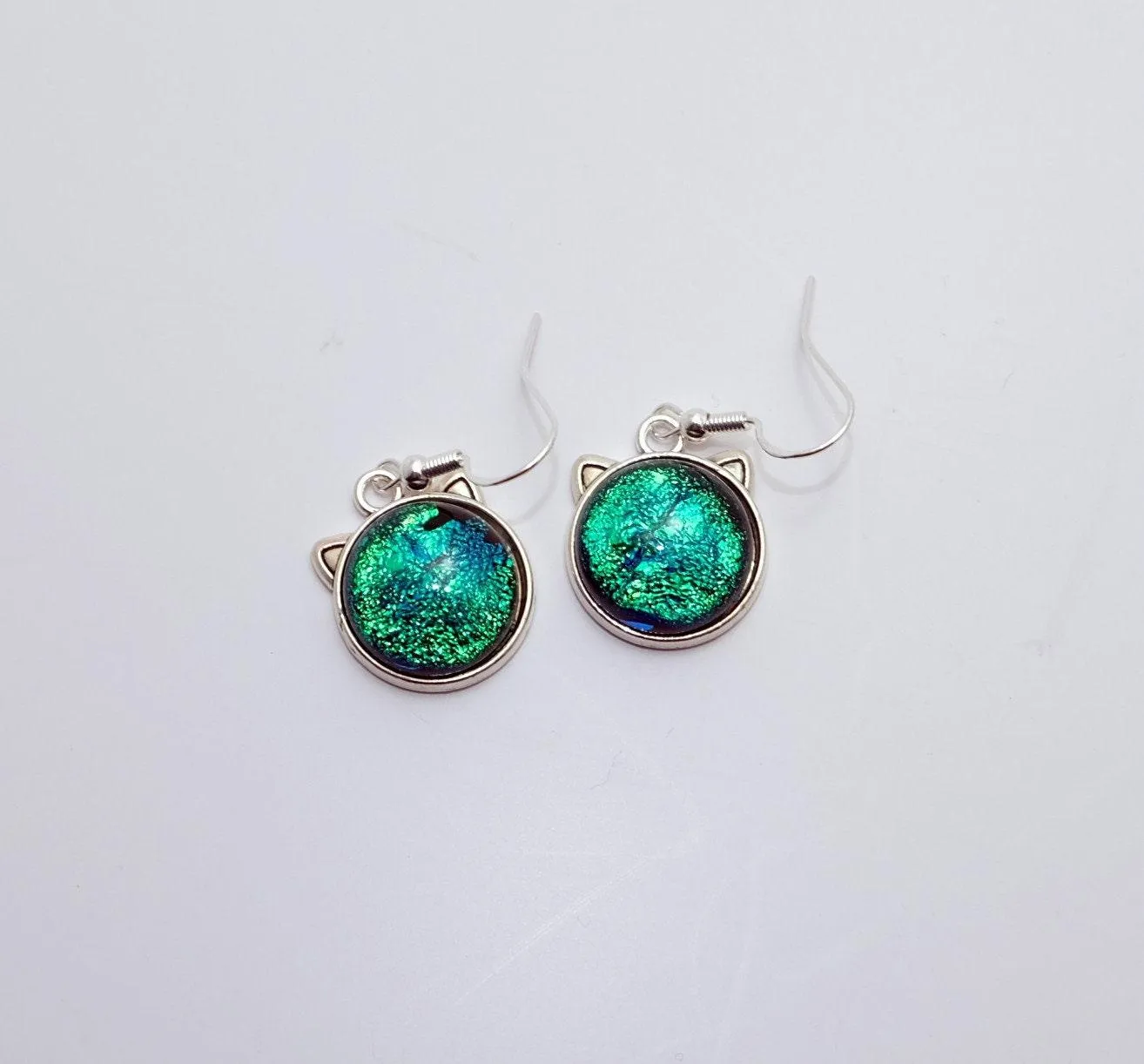 Whimsical Cat Head Shaped pierced Earrings - silver Tone with Green Blue Dichroic Glass