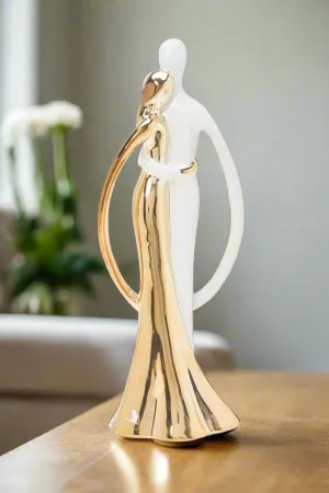 White And Gold Ceramic Sculpture