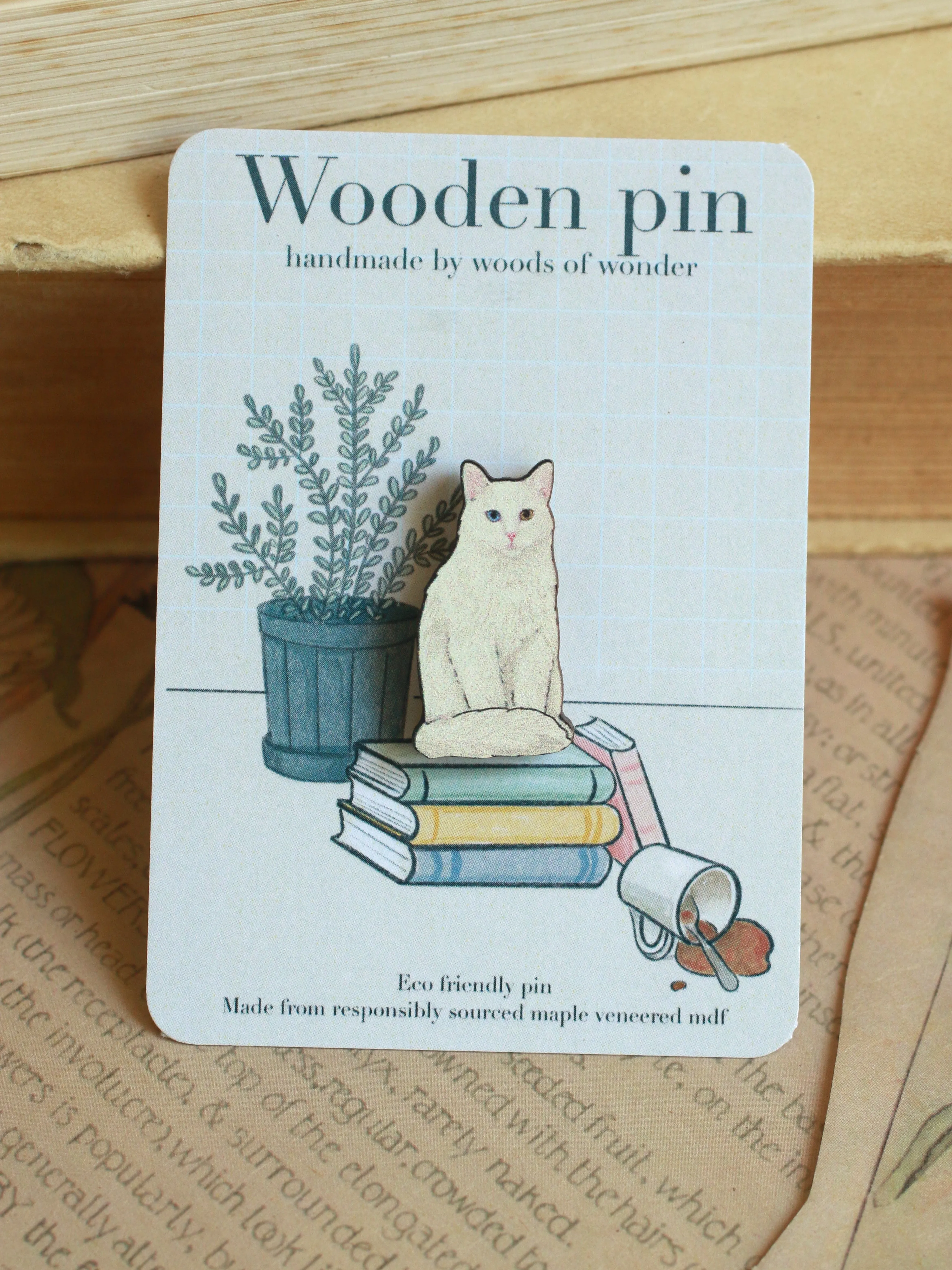 White cat pin