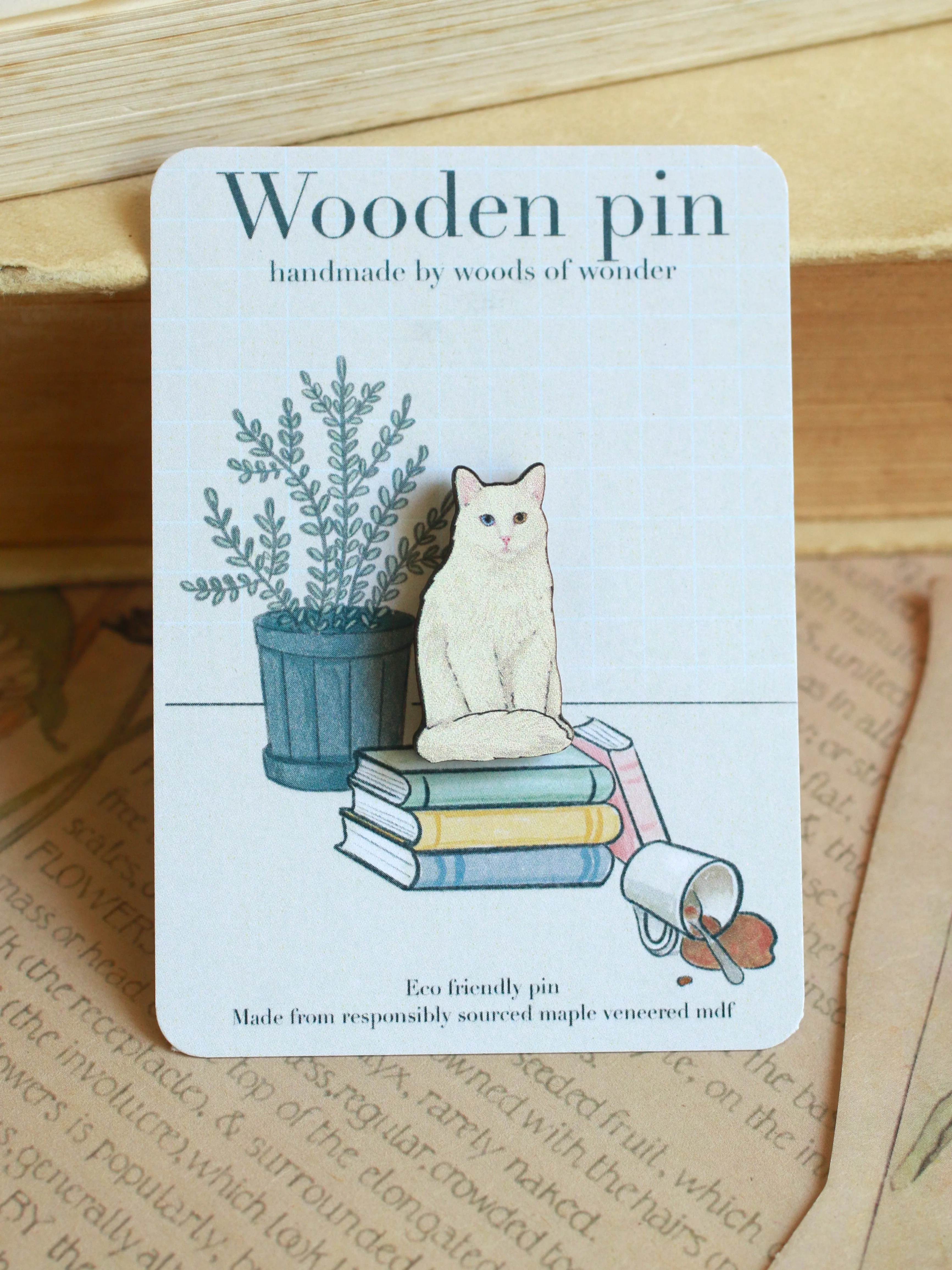 White cat pin