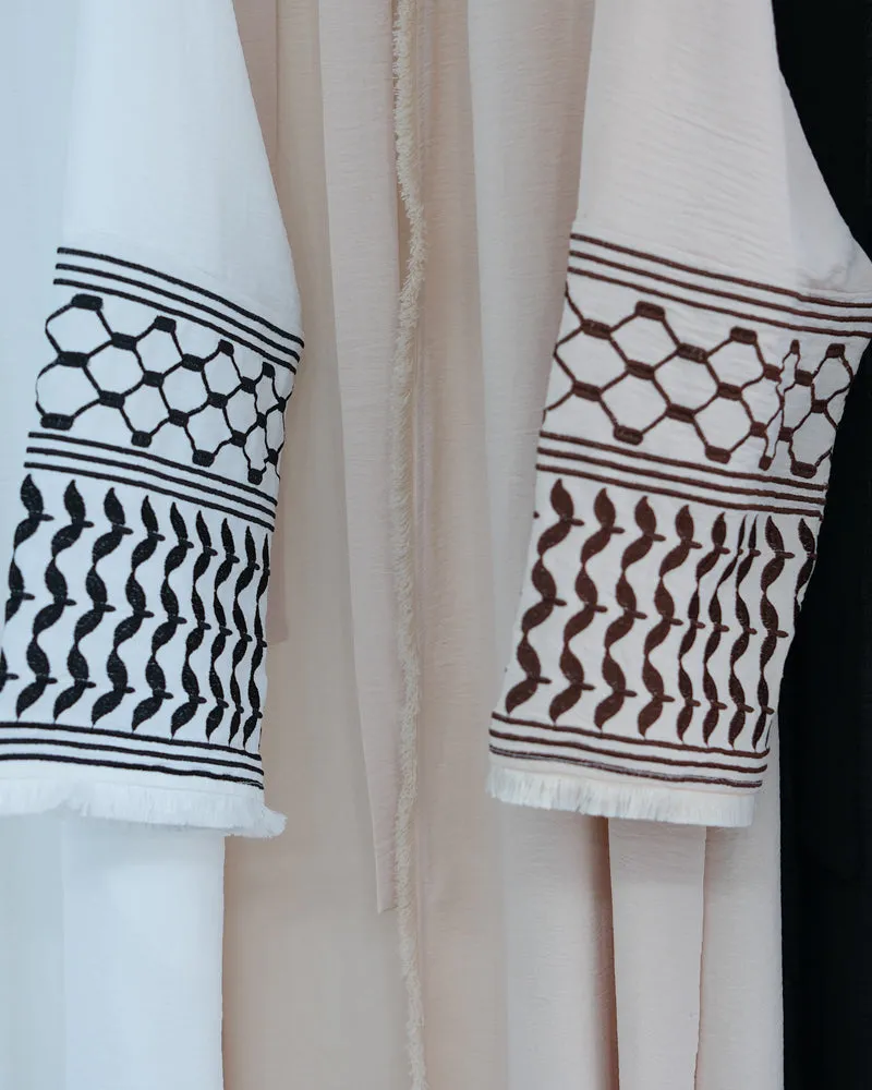 White Keffiyeh Inspired Abaya with contrast embroidered sleeves and detachable belt