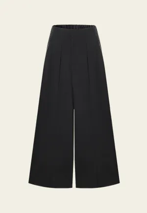 Wide-leg Flared Pleated-detail Faux Leather-trimmed Trousers