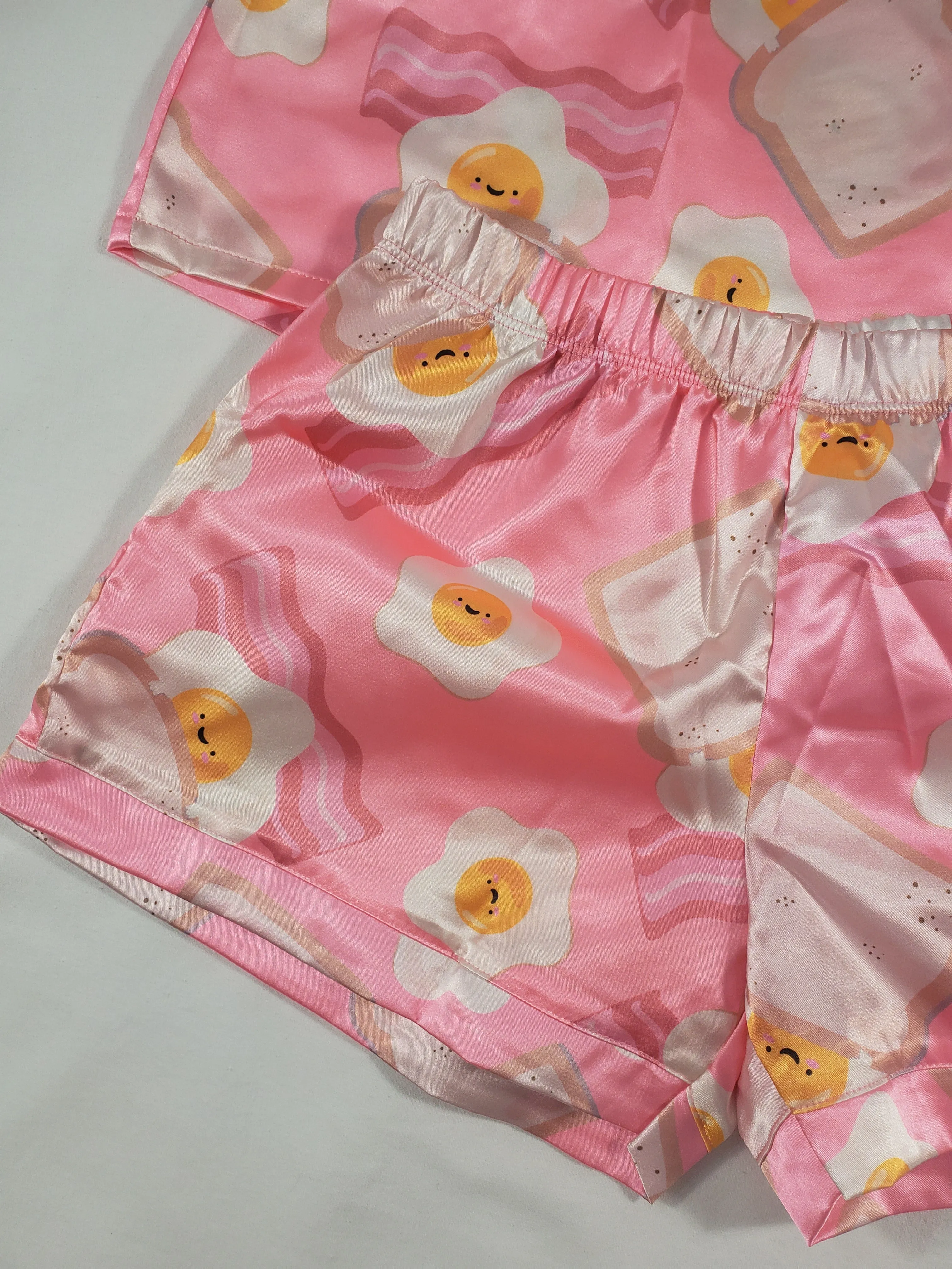 Women's Pink satin pajama set fried eggs bacon and toast theme shorts and blouse