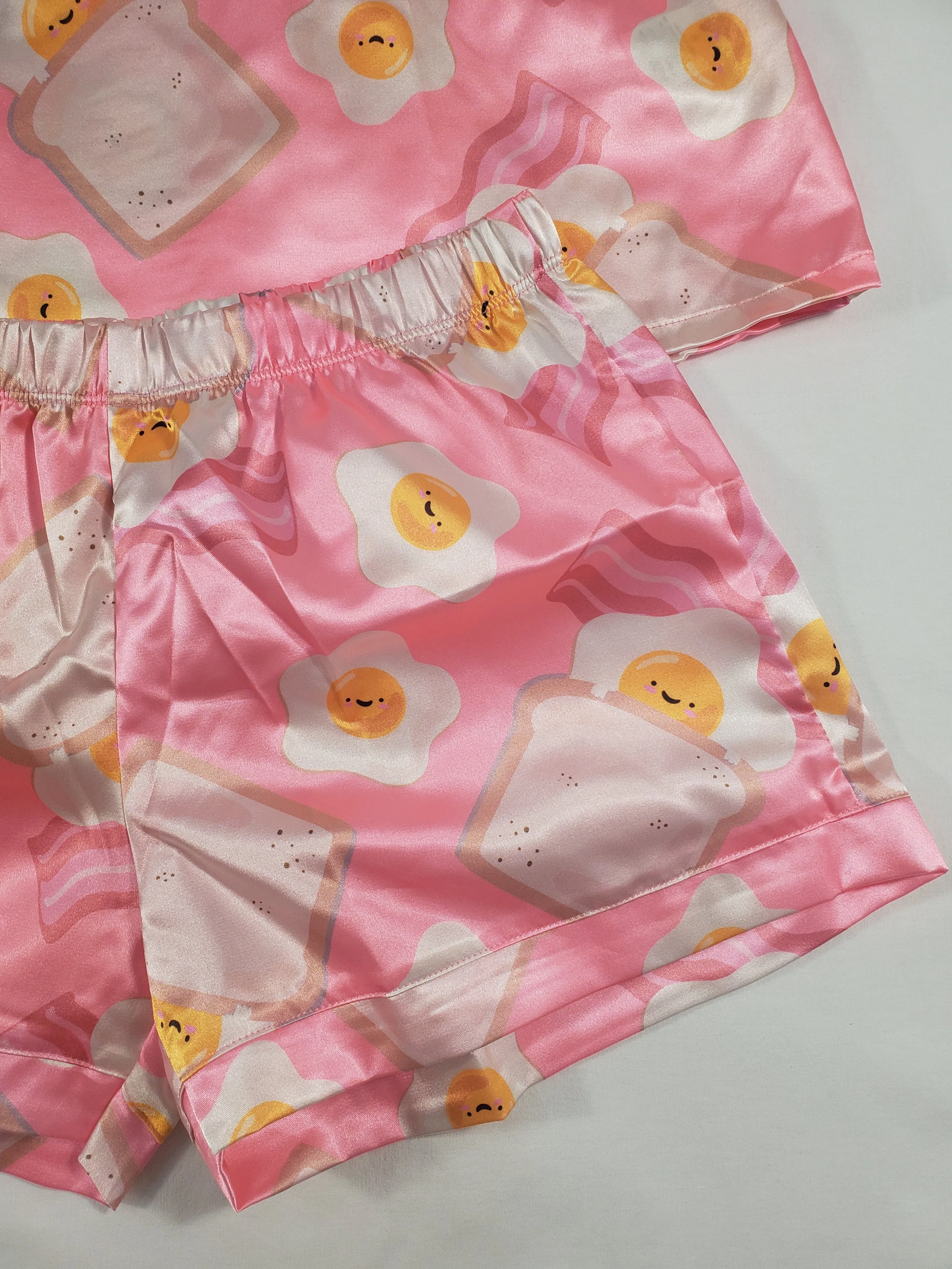 Women's Pink satin pajama set fried eggs bacon and toast theme shorts and blouse