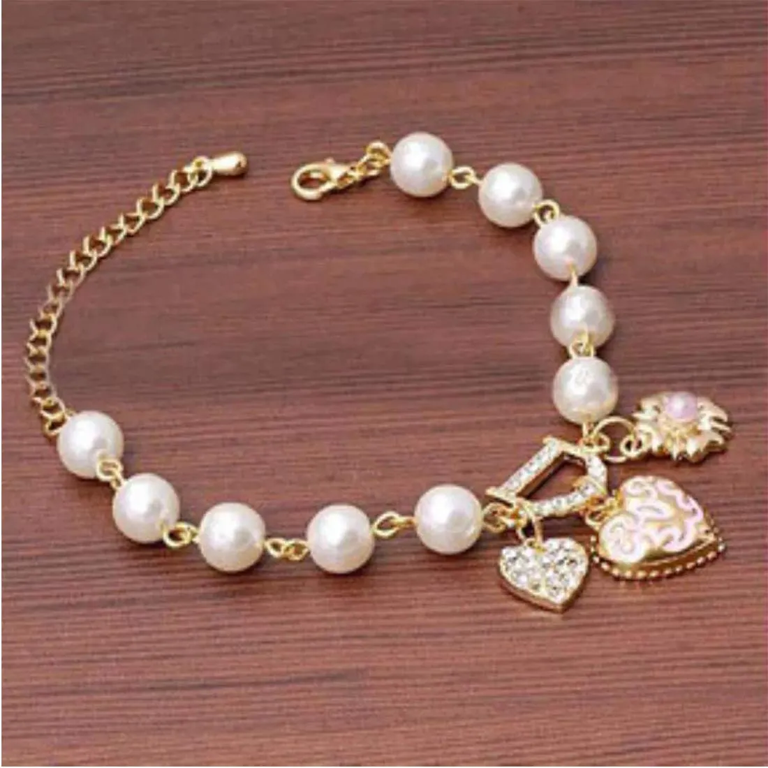 Yellow Chimes Exquisite Pearl Floral Love Heart Gold Plated Charm Bracelet for Women and Girls