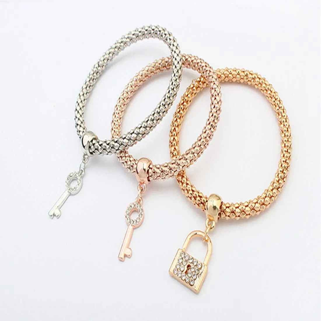 Yellow Chimes Lock and Key Charm Set of 3 Bracelets For Women And Girls.