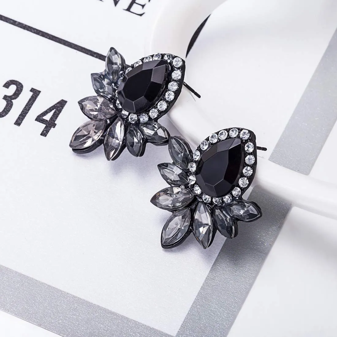 Yellow Chimes Sparkling Leafs Black Stud Earring for Women & Girls.