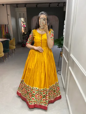 Yellow Color Foil Printed Dola Silk Gown