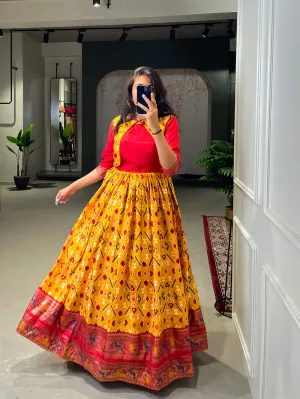 Yellow Color Patola Printed And Foil Printed Dola Silk Gown